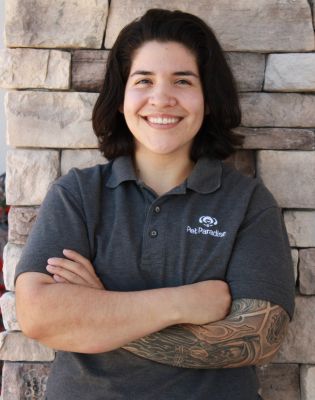 a woman with tattoos on her arm